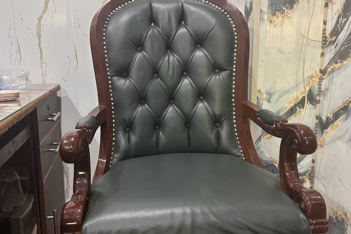 Tufted Leather Swivel Chair — handcrafted wooden furniture from Chiniot, Pakistan