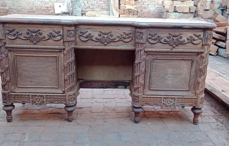 Carved wooden desk — workshop photo
