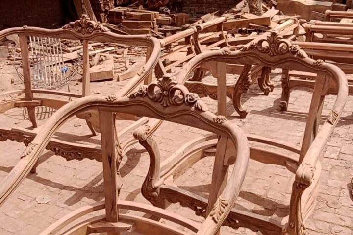 Rose-crest carved armchair — workshop photo
